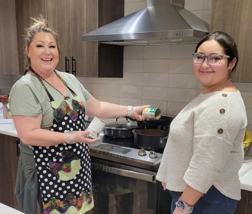 Mom and daughter baking.
